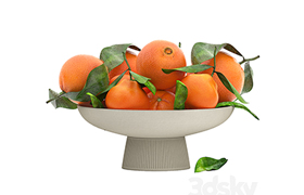 white bowl of oranges